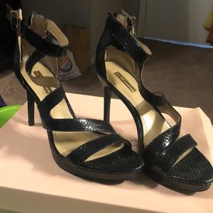 BCBG Black smooth snake skin heel good condition